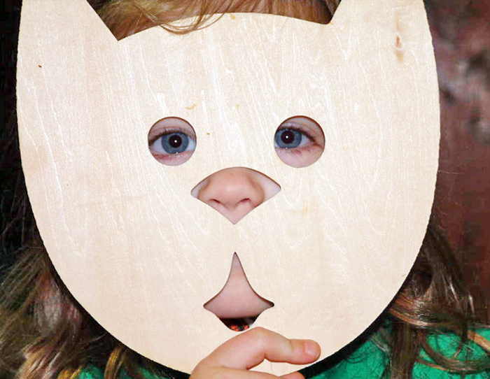 Girl wearing a cat Mask